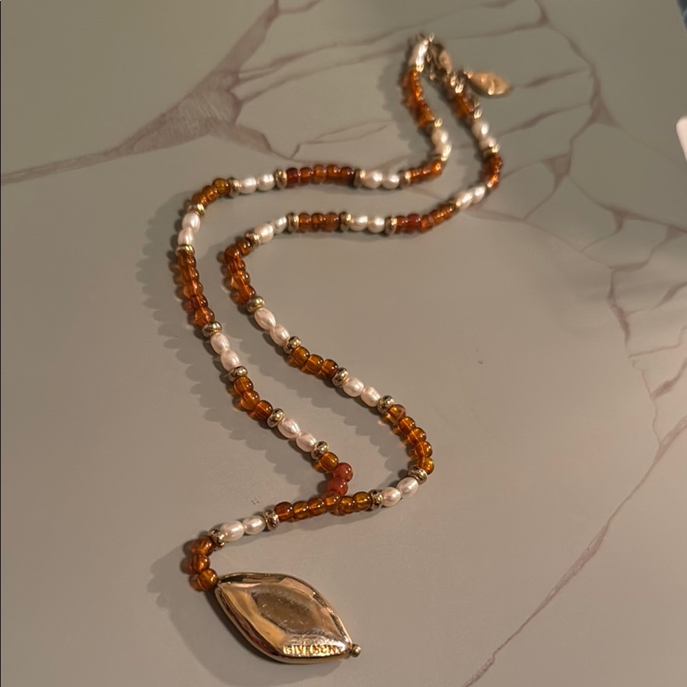 Givenchy White and Gold Necklace with Leaf Pendant